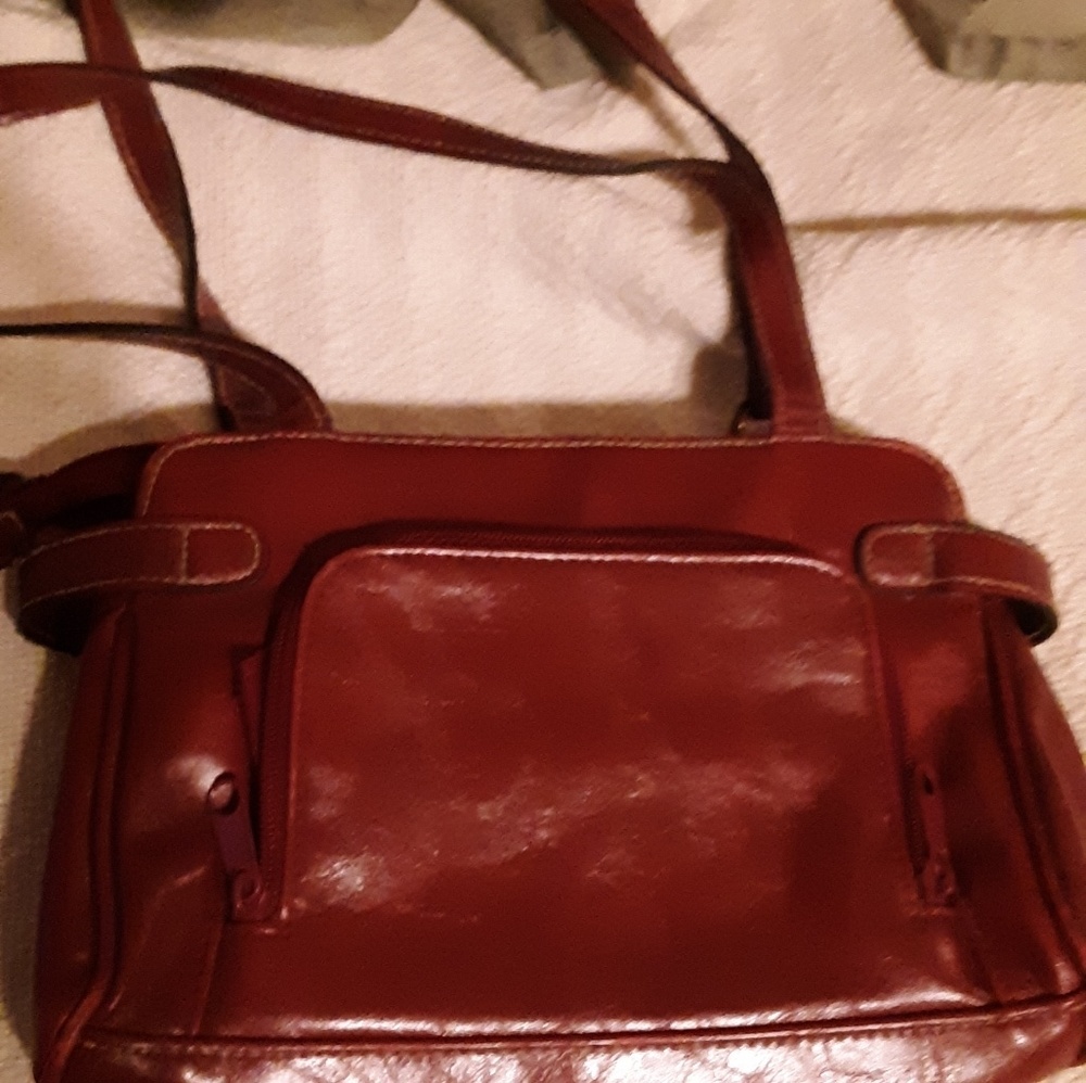 Small red purse, lots of sections to organize.